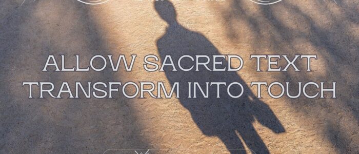 person's shadow on sand in the beam of light